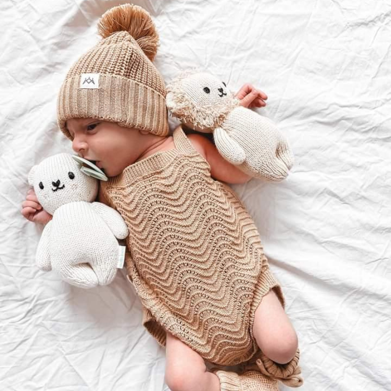 Textured Knit Beanie in Coco on newborn baby with textured toys