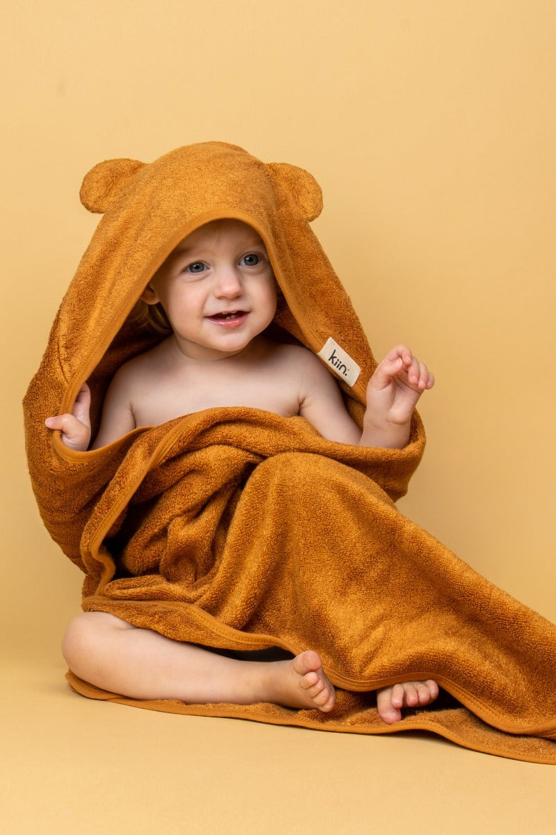 Caramel Hooded Towel wrapped over child