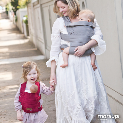 Mum and toddler wearing baby carriers