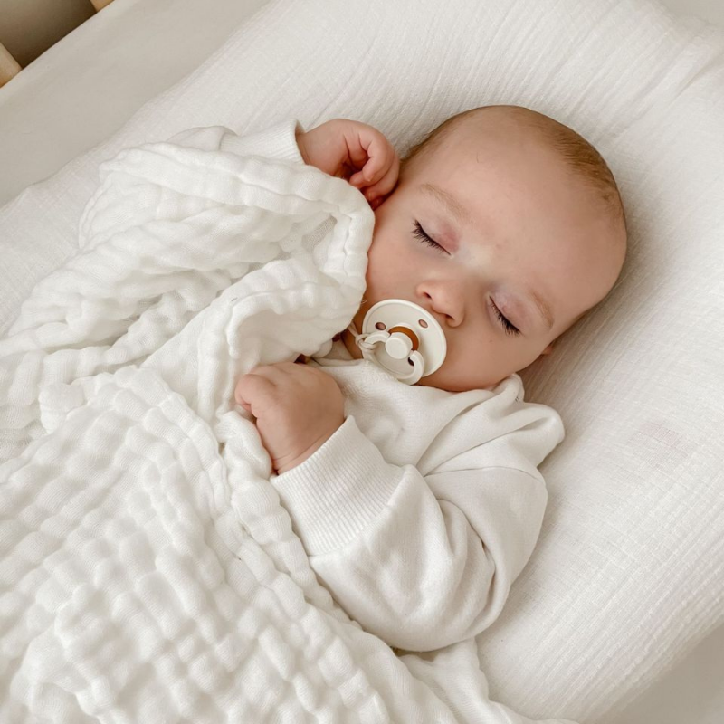 3 Little Crowns Organic Cotton Gauze Blanket keeping sleeping baby warm