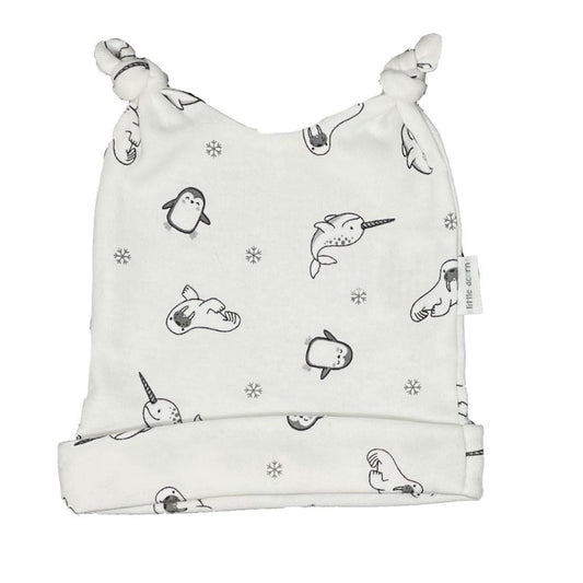 Artic Animals Baby Beanie with a white back ground and black, white and grey little penguins, narwhals and walrus'