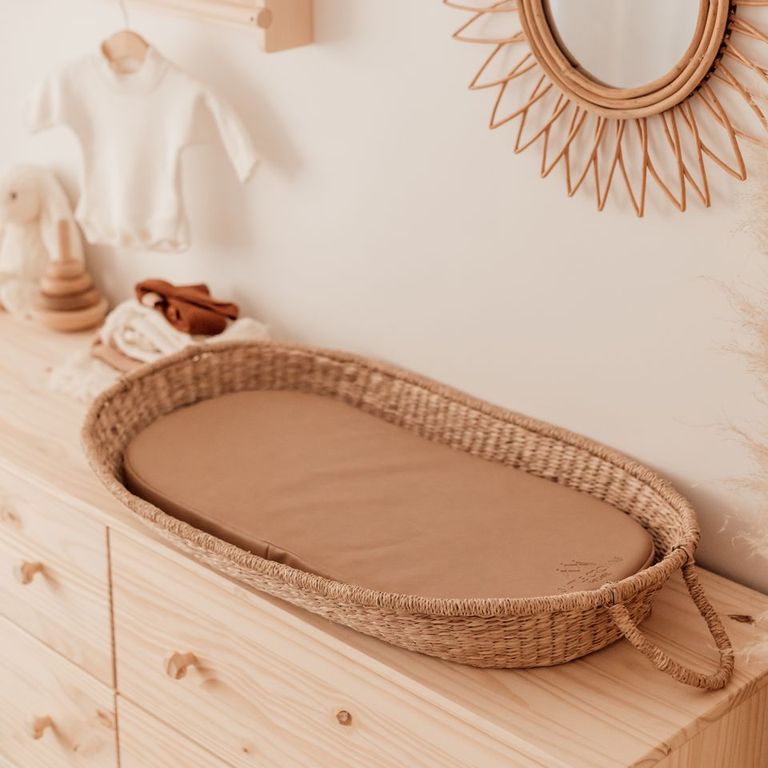 Vegan leather change pad tan in moses basket on chest of draws